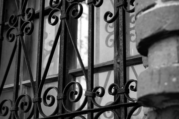 wrought iron bars on the windows in the old church