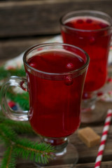 Warm sweet black tea with cranberries for winter © larik_malasha