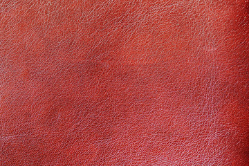 Fototapeta premium Texture of genuine leather spotted, painted, with wrinkle, crease, red brown color, background surface
