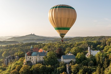 Hot air balloon above Hruba Skala Castle in Bohemian Paradise