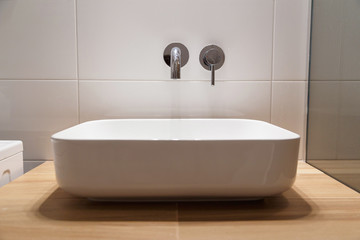 Sink and wall-mounted washbasin mixer