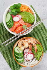 Poke bowl with salmon, shrimps and vegetables