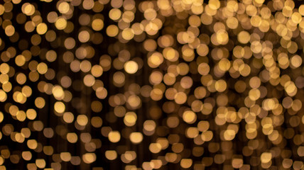 Gold abstract bokeh , light background.