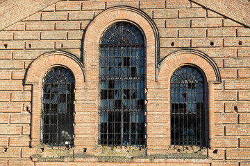 wrought iron bars on the windows in the old church