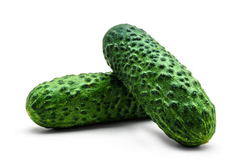 Two green cucumbers isolated on white background