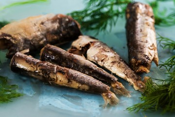 Canned sardines with dill herb.