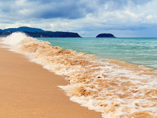 Karon Beach on Phuket Island (Thailand) in cloudy weather in November