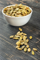 Pumpkin seed kernels in bowl
