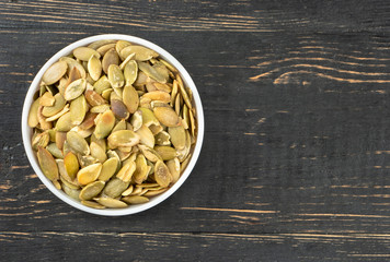 Pumpkin seed kernels in bowl