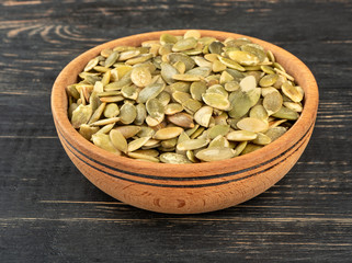 Pumpkin seed kernels in bowl