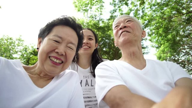 Happy Asian Family parent and daughter In Park 4k