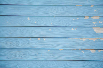 Fototapeta premium Blue wood texture background.Peeling paint wall.