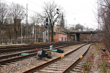 Railroad view of tracks and bridge in the backgorund.