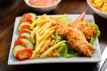 chicken strips and fries
