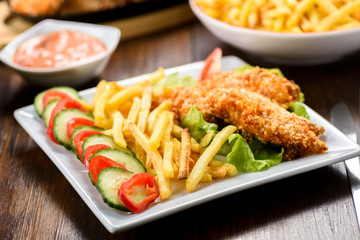 chicken strips and fries