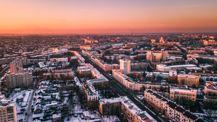 Beautiful sunset on the background of a European city with a copter. Gomel. Belarus.