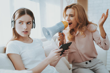 Quarrel between Mother and Daughter in White Room.