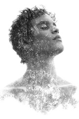 Double exposure in black and white of a young sexy man’s portrait blended with branches of a tropical tree, showing the perfect beauty of nature's creation