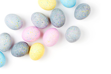 Background with pale pink, blue, yellow and gray Easter eggs. Compositions in pastel colors.  Easter concept