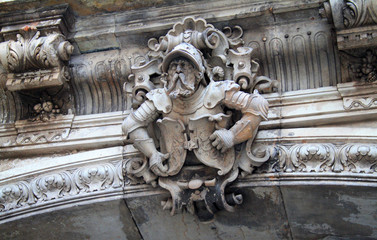 Decorations on the wall in the city center, Dresden, Germany. Knight-like architecture detail