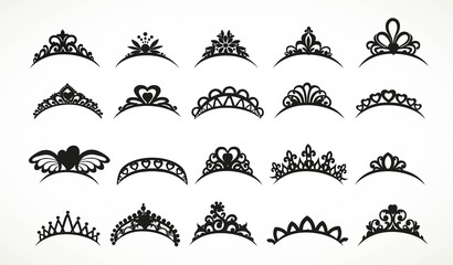Big set of silhouettes tiaras various shapes isolated on a white background - obrazy, fototapety, plakaty