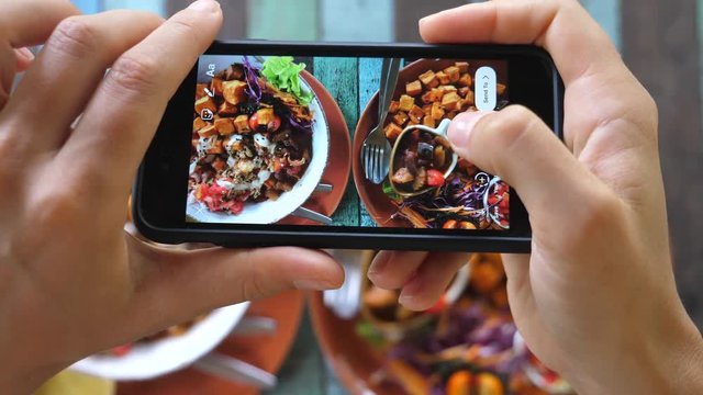 Woman Hands Taking Food Photo Using Smartphone For Social Networks Post. Vegan, Healthy, Organic Meal.