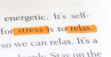 Highlighted English Words "Stress and Relax" in a Book