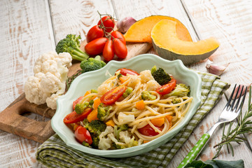 spaghetti with broccoli cabbage pumpkin and tomatoes