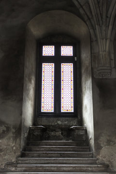 View about a beautiful window in the Huedin castle, Transylvania,  Romania