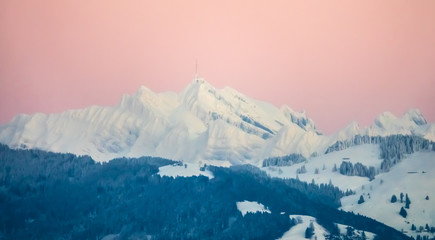 The snow covered Santis peak (2502 m), the highest mountain in the Alpstein massif of northeastern Switzerland and the  culminating point of the Appenzell Alps. 