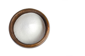 Sugar sand in wooden Cup on white background.