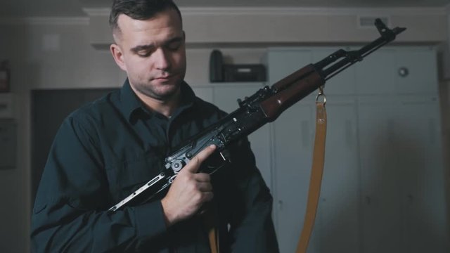 Man training skills with Kalashnikov 