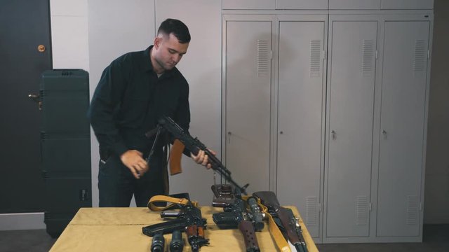 Man training skills with Kalashnikov 