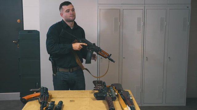 Man training skills with Kalashnikov 