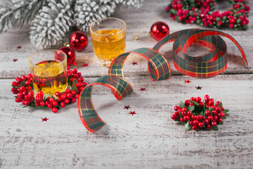 Whiskey, brandy or liquor shot and Christmas decorations