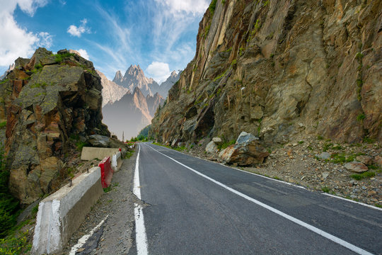 road in to the high mountains between rocky cliff. composite image of dangerous path to the dreams. 