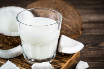 Coconut milk in glass, Vegan milk. 
