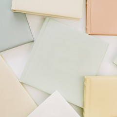 Colorful family wedding photo albums collage. Flat lay, top view.
