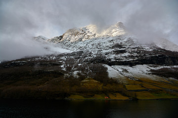 Nærøy fjord in Norway. Landscape of mountains and transparent waters. Spectacular reflections. Dream voyages