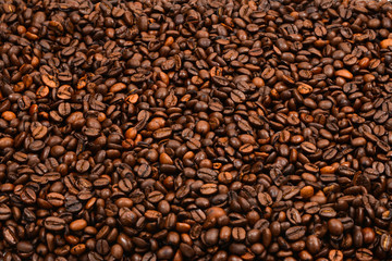Coffee beans background. Top view. Coffee beans texture.