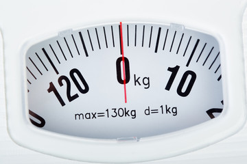 Bathroom scale on white background. Weight loss concept. Weight control by floor scale