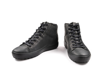 Men's black leather shoes on a white background.