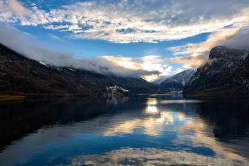 Nærøy fjord in Norway. Landscape of mountains and transparent waters. Spectacular reflections. Dream voyages