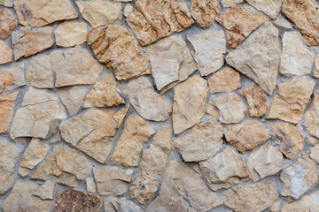 The wall is made of large stones