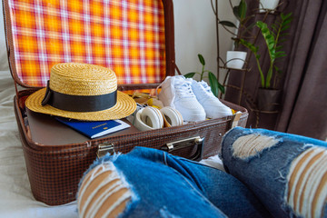 suitcase with clothes ready for trip. travel concept. copy space