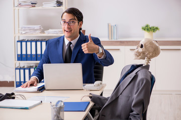 Funny business meeting with boss and skeletons