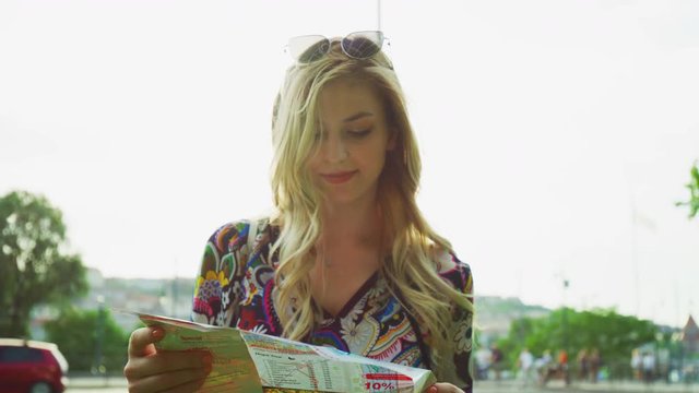 Young woman with a map
