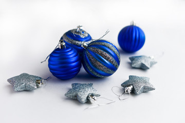 Christmas composition. Christmas blue and silver decorations on white background