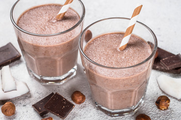 Chocolate coconut hazelnut milkshake or smoothie top view.