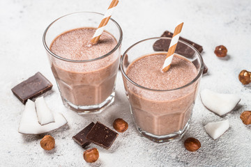 Chocolate coconut hazelnut milkshake or smoothie top view.